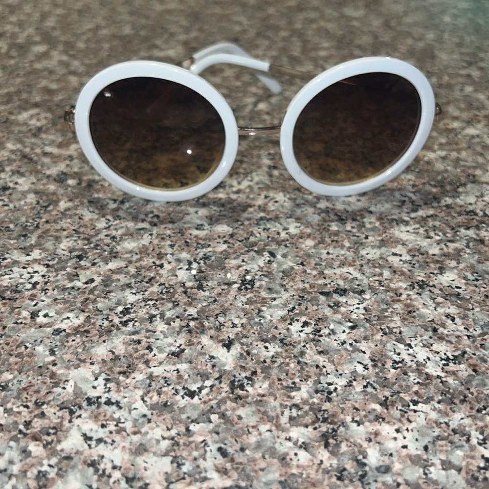 White oval sunglasses